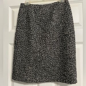 Tahari high waist black and metallic tweed skirt w/bottom slit and metal zipper.